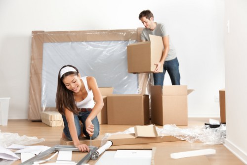 Man with van loading furniture for a local move in Uxbridge