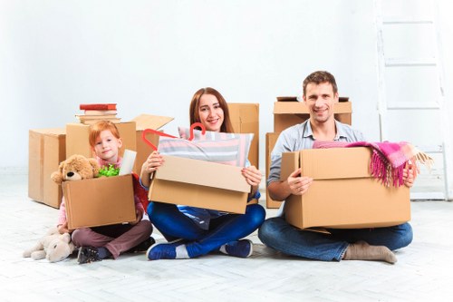Apartment removals in Uxbridge with careful loading near a residential block