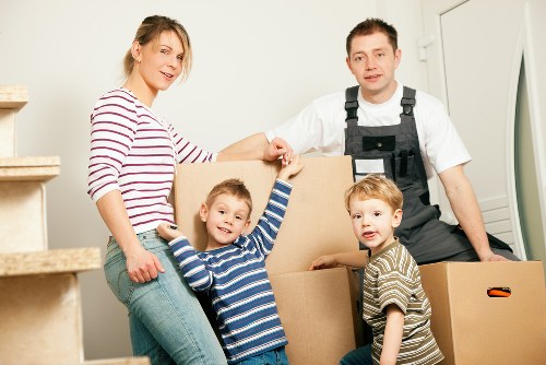 Unpacking service helping a family settle into a new home