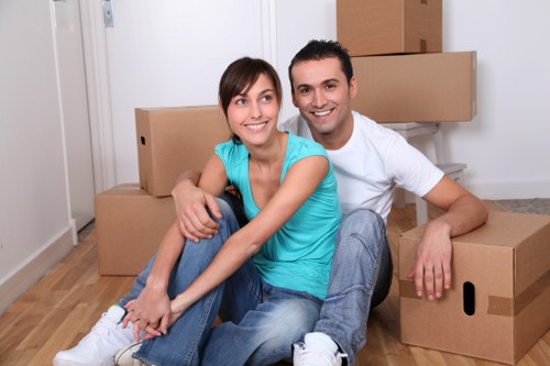 Professional removals team protecting furniture and property