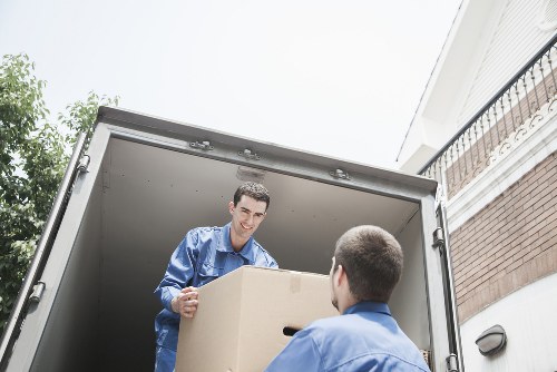 Driver completing pre-journey safety checks on a removal vehicle