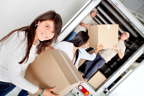 Prepared boxes and furniture in a Uxbridge family home before moving day